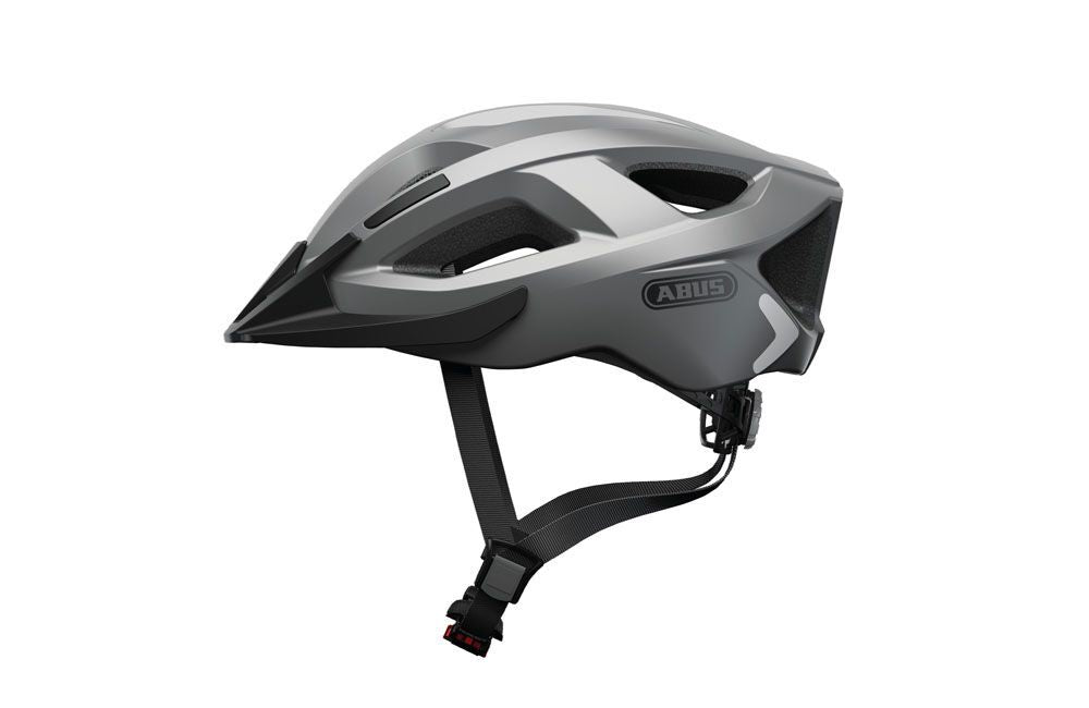Casco bicicleta ABUS Aduro 2.0 color plateado glare silver con luz LED trasera encendida y visera desmontable.